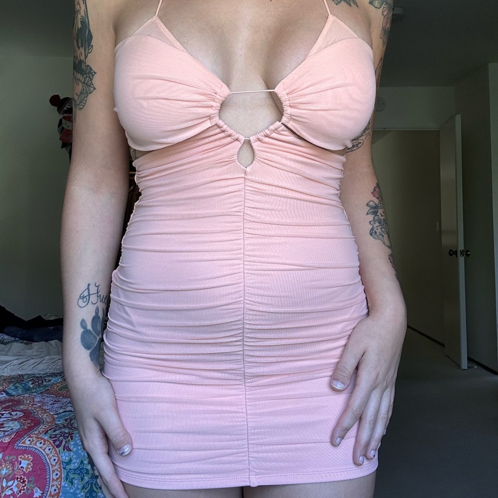 Ruched cut out mini dress in blush
